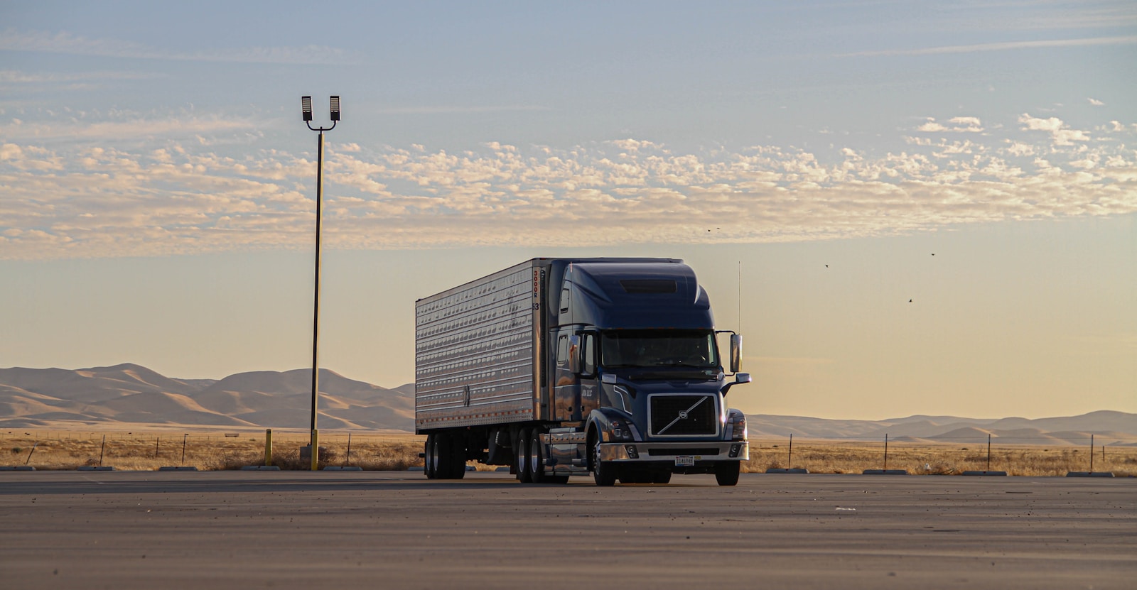 black truck on road during daytime Commercial Trucking